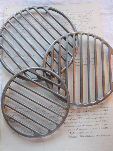 metal trivet sign for antique house|Antique Metal Trivet for sale .